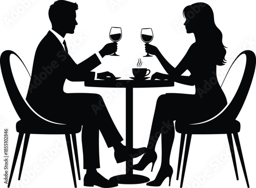 Couple sitting at table with wine glasses and coffee cup woman