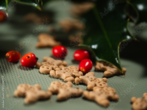 Christmas gingerbread men minature cookies wiith red berries