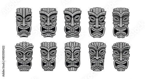 Collection of stone tiki masks with different fierce expressions represents Polynesian culture, tribal art, and tropical island decorations.