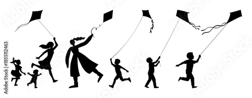 silhouette of kids  with kite s flying for festival and holidays