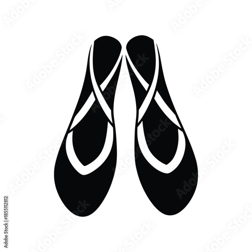 A pair of classic black ballet slippers with ribbons tied around the ankles, symbolizing grace and performance