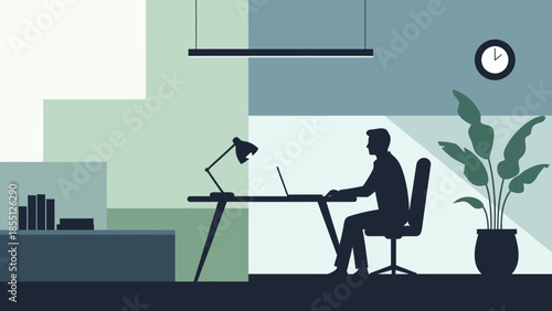 Man Working on Laptop at Desk.