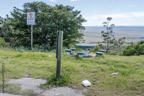 litter notwithstanding warning at picnic area near Olifantskoppe pass, Karoo, South Africa