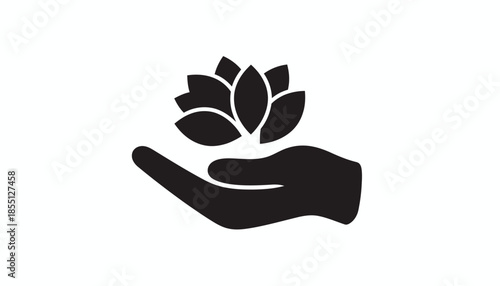 Hand holding a lotus flower, a symbol of purity and enlightenment.