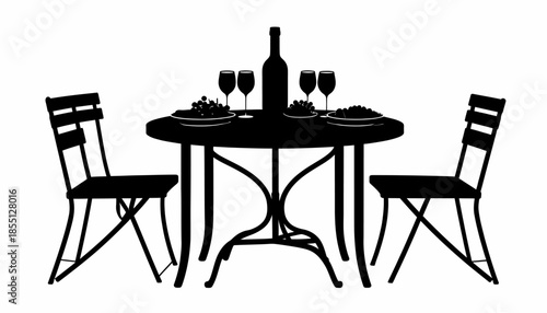 Silhouette of a table set for dinner with wine and chairs.
