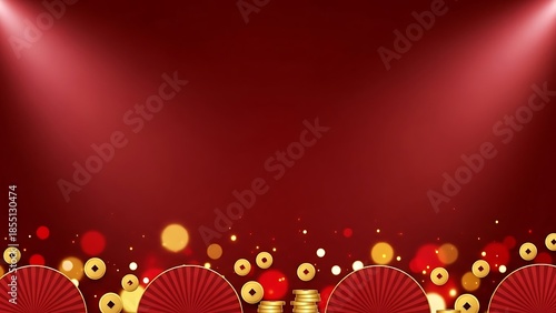 A dimly lit stage with red chairs and warm spotlights shining down