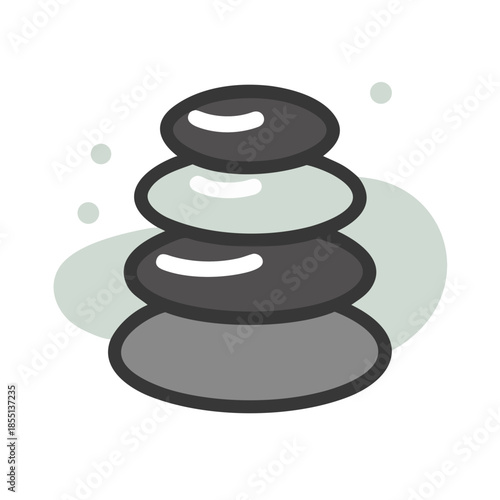 Stacked stones in serene setting