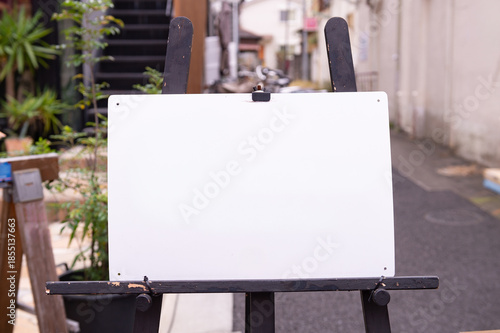 Large blank billboard on a street wall, banners with room to add your own text