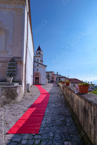 A narrow street among the old houses of Sant'Angelo d'Alife, a town in the province of Caserta, Italy.