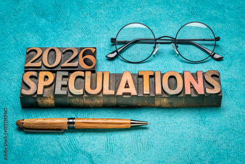 2026 year speculations concept - text in vintage letterpress wood type printing blocks with reading glasses, expectations and predictions for the New Year