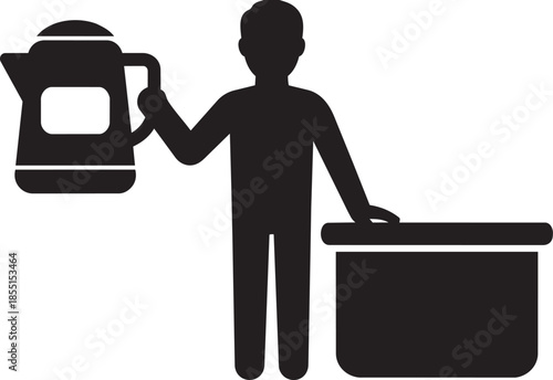 man holding an electric kettle and standing next to a table or countertop