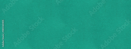 The image is a solid background of teal color with a slightly textured appearance. It appears to be a plain, uniform surface.