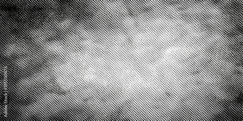 An abstract grunge paper texture background with a rough vintage design features a gray textured surface and old canvas material for a dark artistic backdrop