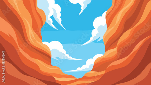 Breathtaking view looking up from a canyon, revealing a stunning blue sky with white clouds framed by towering orange rock walls.