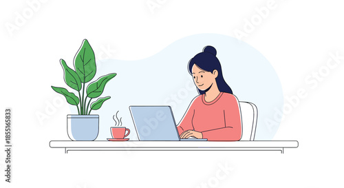 Young woman sitting at a desk and working on her laptop with a steaming cup of coffee and a large houseplant nearby.