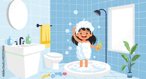 Happy young girl enjoys her bath time in a modern blue tiled bathroom while covered in playful white soap bubbles.