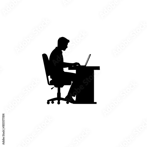silhouette of a man working on a laptop