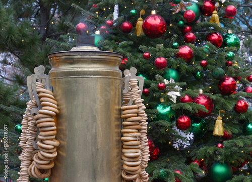 New Year's Eve decoration of street. Christmas trees with balls on branches.