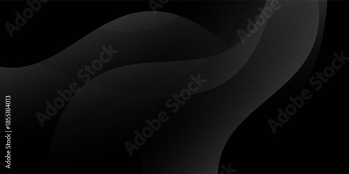 Sandblasted or brushed titanium or steel metal surface, the light reflection of the curved lines creates a smooth gradation on the dark black metallic background