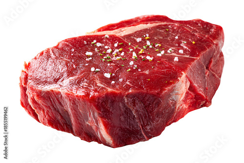 Raw ribeye steak with seasoning