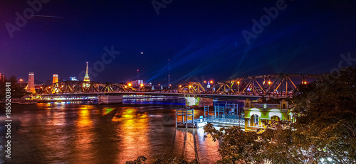 The Memorial bridge, or Phra Phuttayotfa bridge, viewed from the Chao Phraya riverside, Bangkok, Thailand