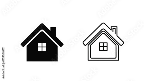 Two simple house icons a solid black and a white outline design
