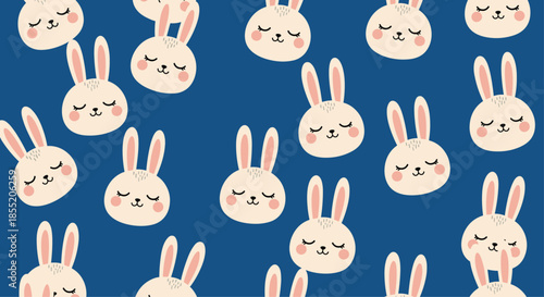 Seamless pattern with adorable sleeping bunny faces with rosy cheeks on a calming dark blue background for nursery decorations.