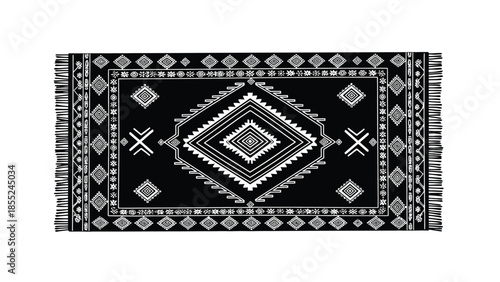 A black and white geometric patterned rug with a fringed edge is displayed