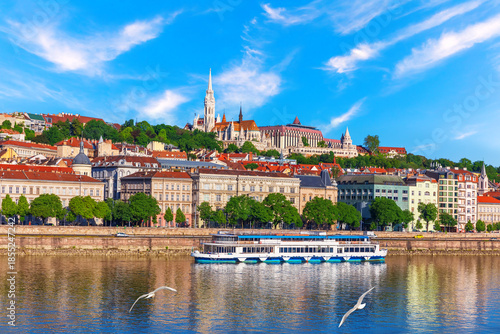Panoramic view of Budapest skyline with Buda Castle and Matthias Church on Castle Hill, sunny day view from the Danube River