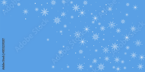 White delicate, lacy snowflakes are carried by the wind against a blue background. Christmas or New Year's background. Vector