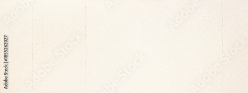 Vintage grain texture with subtle film overlay creates authentic retro atmosphere. Beige background features fine dust particles and scratches for nostalgic photography effects.