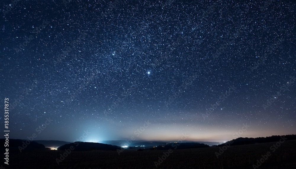 Fototapeta premium a vast field of stars twinkles in the dark night sky creating a mesmerizing view of outer space cosmic wonder and serenity