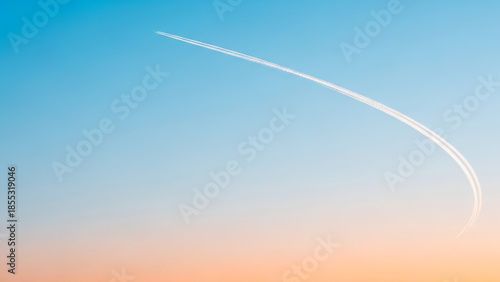 Airplane Trail Across Clear Sky on Blue Gradient Background — Minimal Travel Concept with Large Copy Space