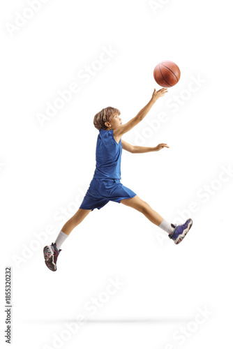 Boy jumping and enjoying a basketball game