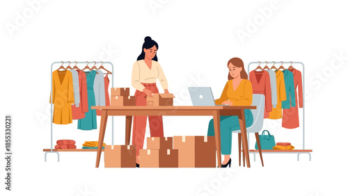 Fashion business owners managing orders online in boutique clothing store