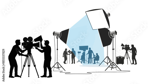 Film crew silhouette in photography studio with lighting equipment