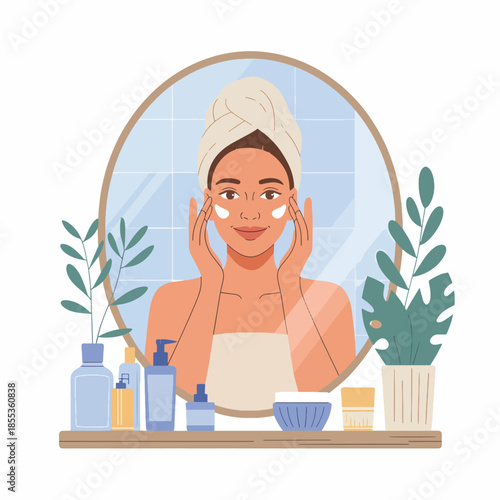 A woman applies cream to her face while looking in a mirror, surrounded by skincare products on a shelf with a plant, conveying a health and wellness routine in a serene setting.