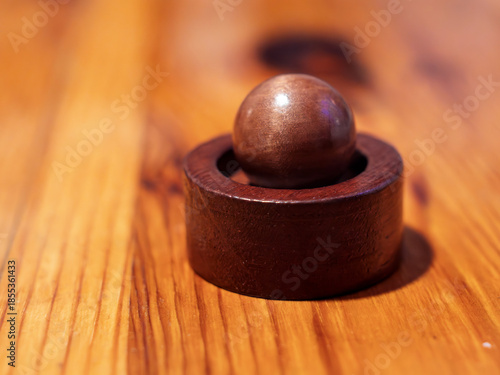 Wooden Puzzle Toy with Ball and Base