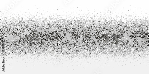 Abstract grayscale texture featuring scattered particles and a grainy speckled pattern