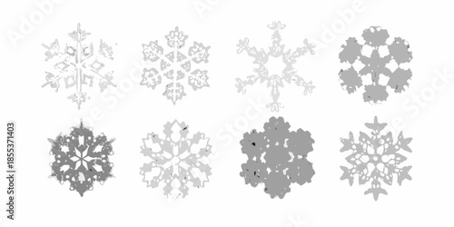 An arrangement of diverse grayscale snowflake illustrations in a grid pattern