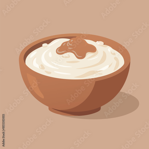 Creamy dessert in a bowl with a swirl on top.