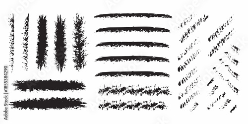 Collection of diverse black brush strokes and textures on a white background
