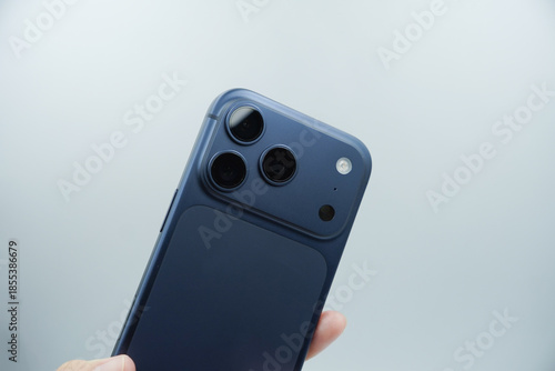 The rear camera of the expensive smartphone is in deep blue with a white background.