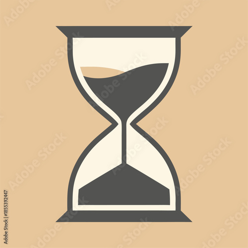 Hourglass with sand flowing representing time passing.