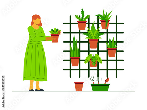 A woman is arranging plants with a vertical garden concept which is also known as a green wall or living wall. Urban farming vector illustration. Flat illustration concept.