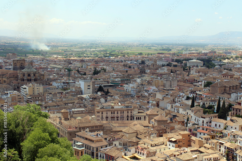 Naklejka premium Granada Cathedral with mountain Landscape from Alhambra – Granada, Spain, July 2024