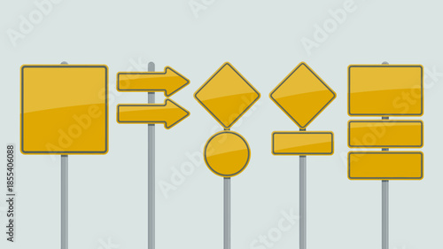 Collection of Yellow Blank Road Signs on Gray Poles Against a Light Blue Background