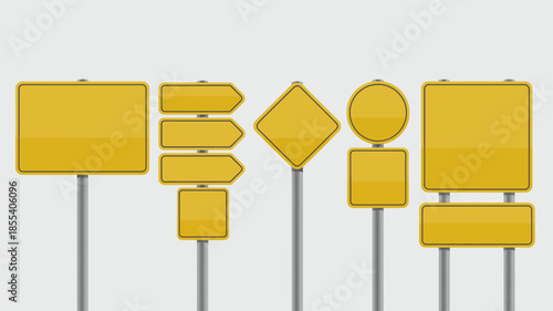 Collection of various blank yellow road signs on metal poles, clear background