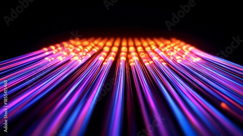 Colorful fiber optic cables illuminated in a dark setting representing blazing-fast connectivity, technology and digital speed concept