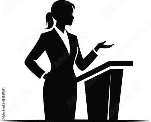 Strong silhouette of a woman in a suit standing at a podium delivering a compelling presentation
